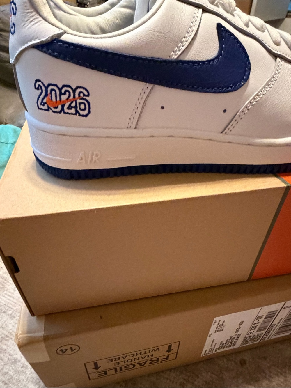 Nike White orange and blue NY Knicks air force ones.